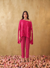 One shoulder cape top with straight fit pants in Hot pink