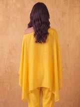 One shoulder cape top with straight fit pants in Mustard yellow