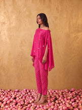 One shoulder cape top with straight fit pants in Hot pink